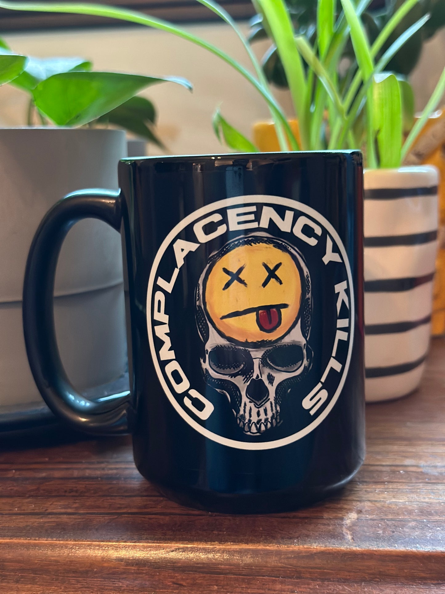 COMPLACENCY KILLS MUG